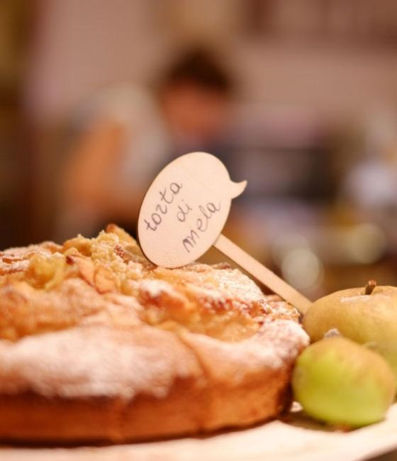 Delicious apple pie with powdered sugar.